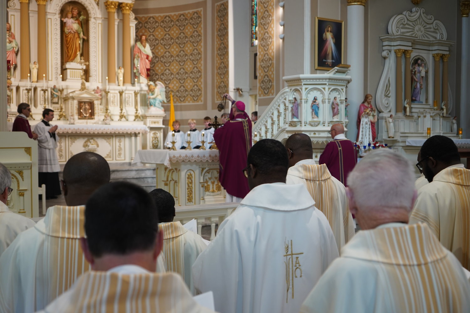 Bishop W. Shawn McKnight and priests of the Jefferson City diocese offer Mass for the repose of deceased priests of the diocese on Nov. 5 in St. Joseph Church in Westphalia.